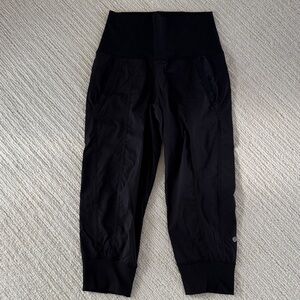 Lululemon capris. Size 4 black. Wide stretchy waistband. Knit cuffs.